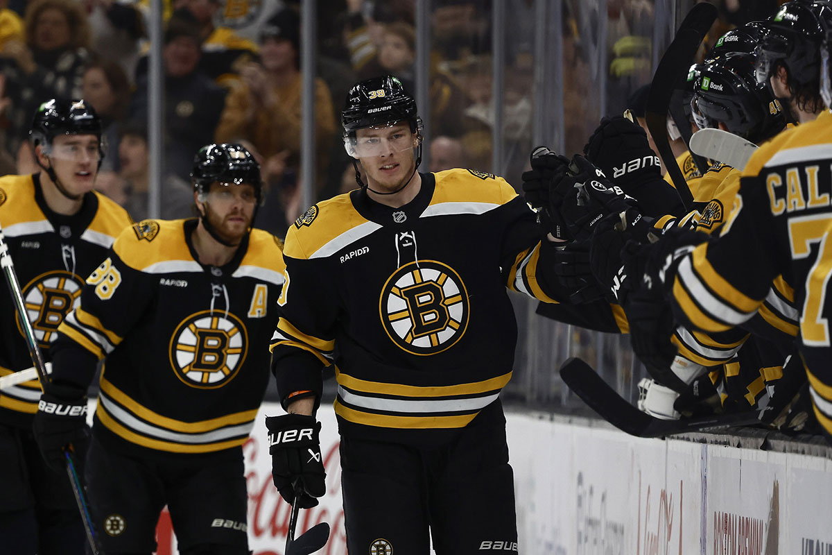  Boston Bruins center Morgan Geekie (39) is congratulated at the bench after scoring against the Vegas Golden Knights during the second period at TD Garden.