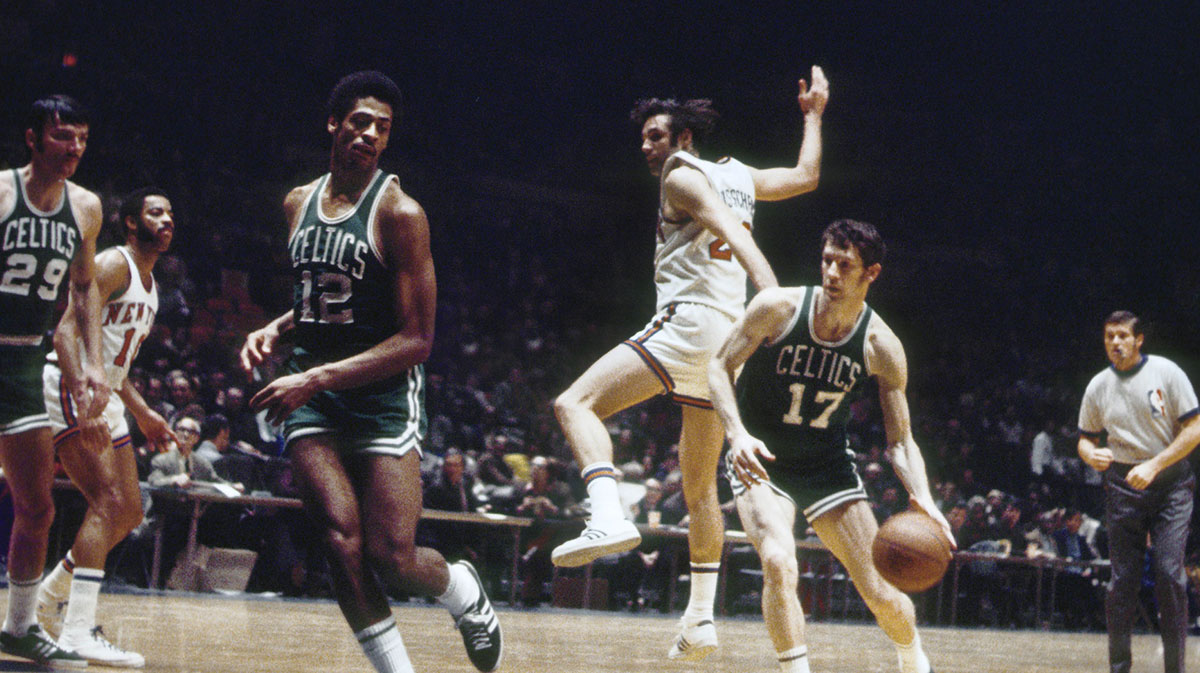 The Boston Celtics striker John Havlicek (17) and Garde Don Chaney (12) in action against New York Knicks at Madison Square Garden.