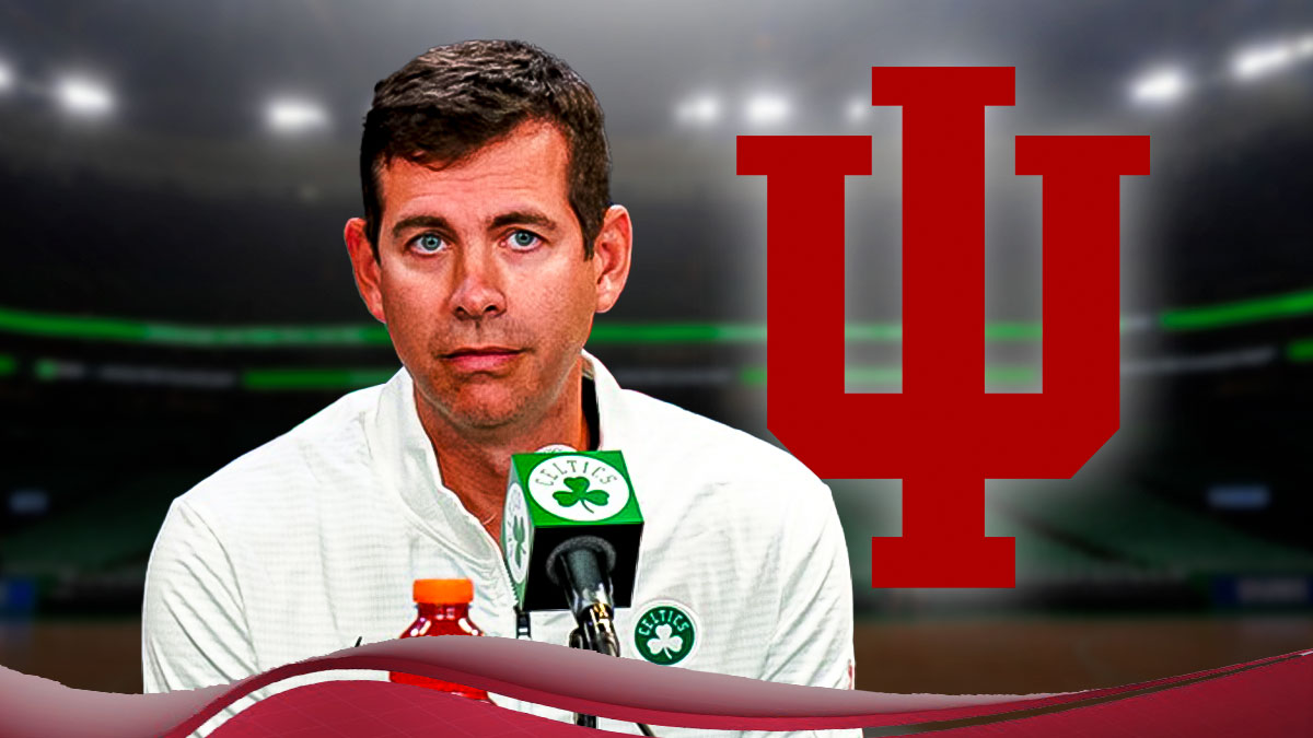 Boston Celtics president of basketball operations Brad Stevens next to the Indiana Hoosiers basketball logo in front of the TD Garden.