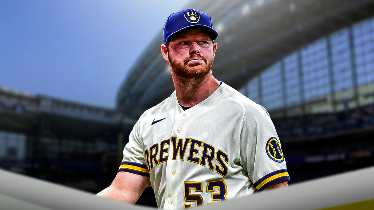 Milwaukee Brewers star Brandon Woodruff in front of American Family Field.