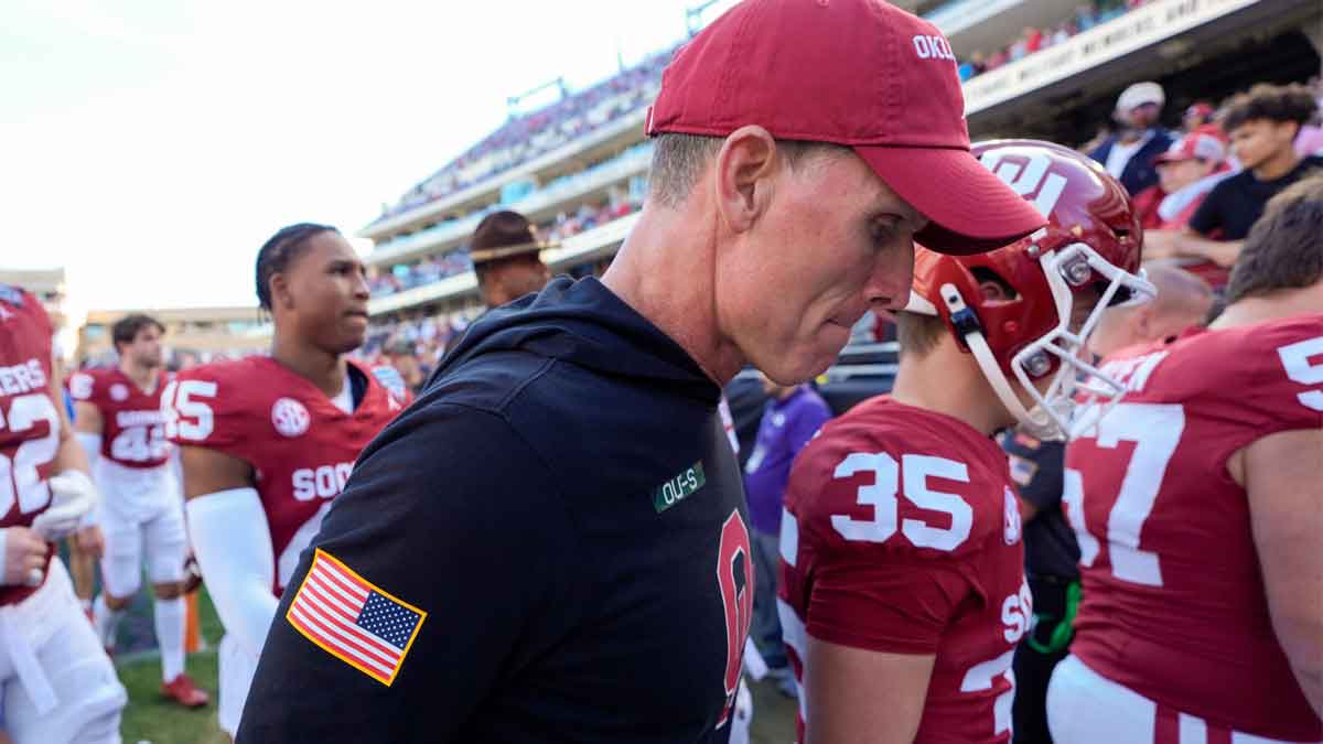 Oklahoma coach Brent Venables walks off the field after the Armed Forces Bowl football game between he University of Oklahoma Sooners (OU) and the Navy Midshipmen at Amon G. Carter Stadium