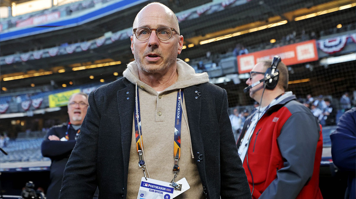 New York Yankees general manager Brian Cashman walks on the field before game three of the 2024 MLB World Series between the New York Yankees and the Los Angeles Dodgers at Yankee Stadium. 