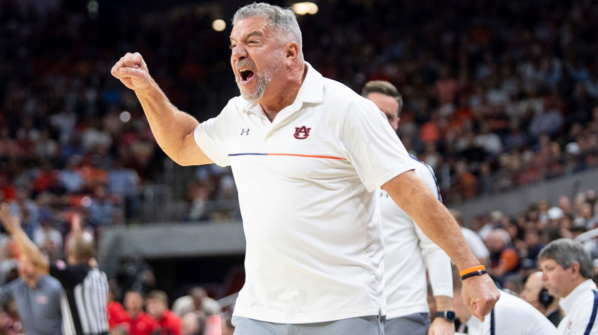 Auburn Tigers head coach Bruce Pearl talks with his team as Auburn Tigers take on Ole Miss Rebels at Neville Arena in Auburn, Ala., on Wednesday, Feb. 26, 2025.