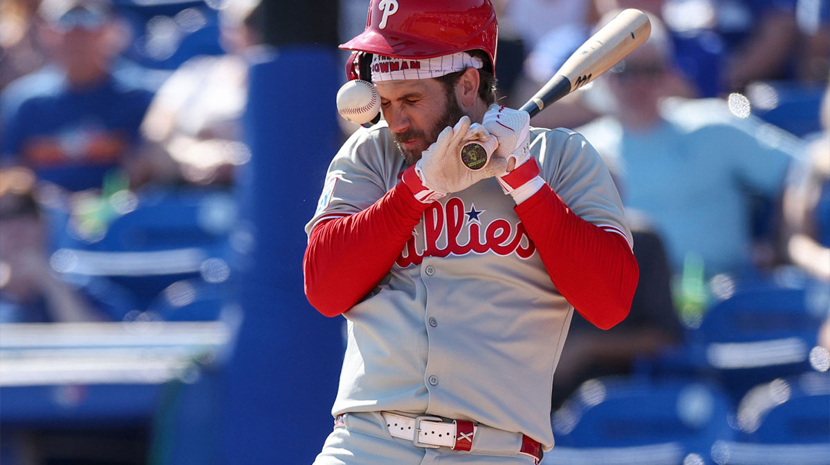 Philadelphia Phillies first base Bryce Harper (3) is hit by a pitch against the Toronto Blue Jays in the sixth inning during spring training at TD Ballpark.