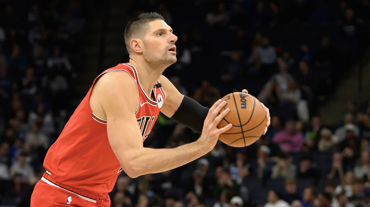 Chicago Bulls Center Nikola Vučević (9) shoots the ball against Minnesota Timbervolves during the first quarter in the target center.