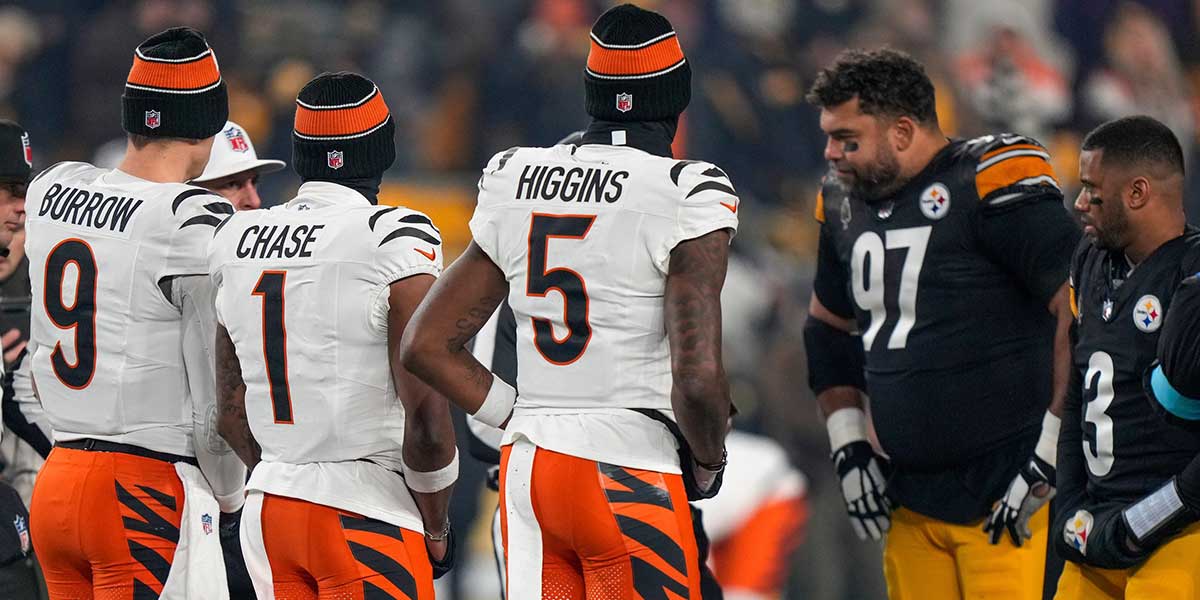 Cincinnati Bengals wide receiver Ja'Marr Chase (1), quarterback Joe Burrow (9) and wide receiver Tee Higgins (5) take the field as captains for the coin toss before the first quarter of the NFL Week 18 game between the Pittsburgh Steelers and the Cincinnati Bengals at Acrisure Stadium in Pittsburgh on Saturday, Jan. 4, 2025.