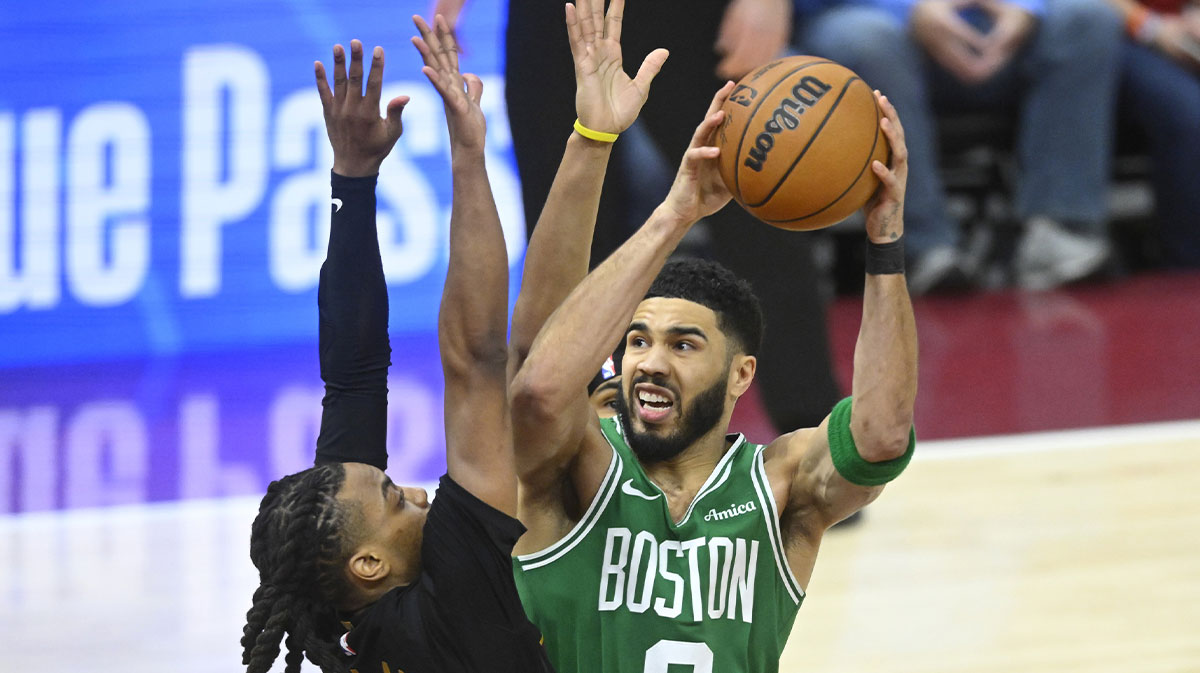 Cleveland goalkeeper Darius Garland (10) defends the Boston Celtics striker Jayson Tatum (0) in the fourth quarter to Rocket Mortgage Fieldhouse.