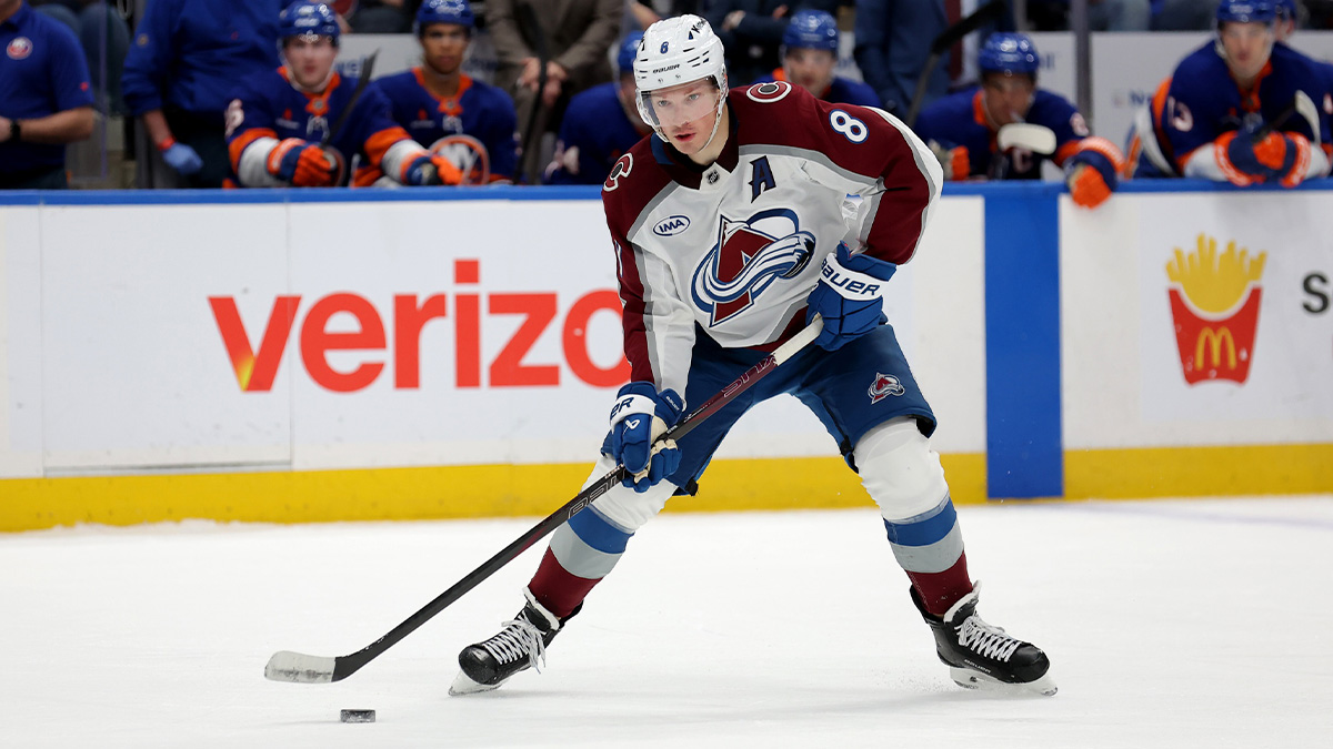 Colorado Avalanche defenseman Cale Makar (8) skates with the puck against the New York Islanders during the third period at UBS Arena.