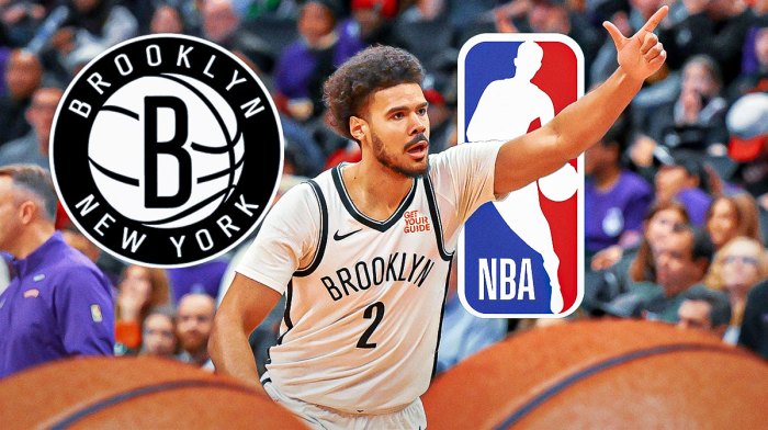 Nets forward Cam Johnson next to the NBA logo with the Nets logo in the background