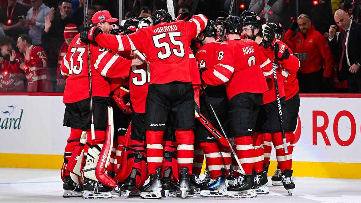 Feb 12, 2025; Montreal, Quebec, CAN; [Imagn Images direct customers only] Team Canada players celebrate a win against Team Sweden in overtime during a 4 Nations Face-Off ice hockey game at Bell Centre.