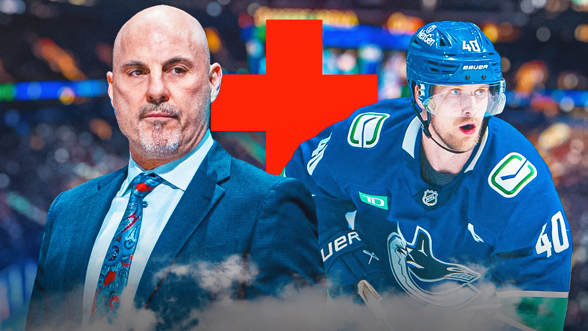 Elias Pettersson with a red medical cross along with coach Rick Tocchet inside Rogers Arena in Vancouver