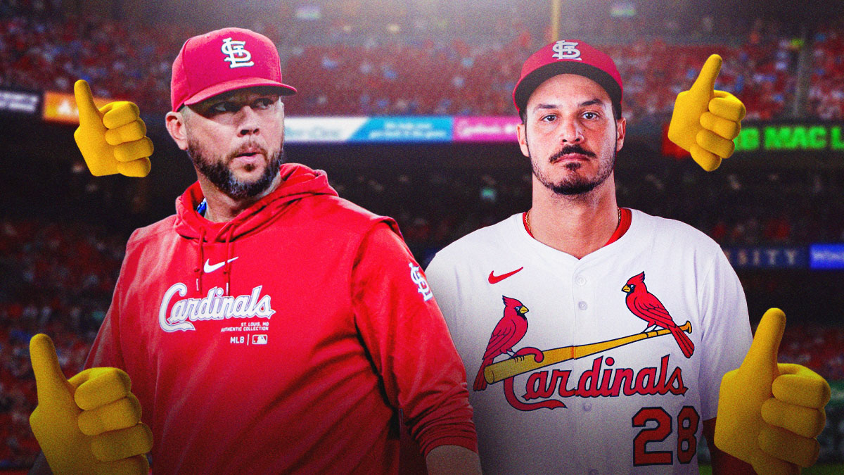 Cardinals manager Oli Marmol and Nolan Arenado next to him. There are thumbs up emojis around the image.