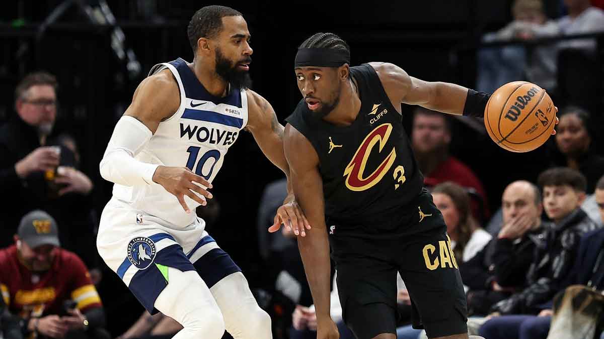 Cleveland Cavaliers Guard Caris Levert (3) Works about Minnesota Timbervolves Guard Mike Conlei (10) during the second quarter at the target center.