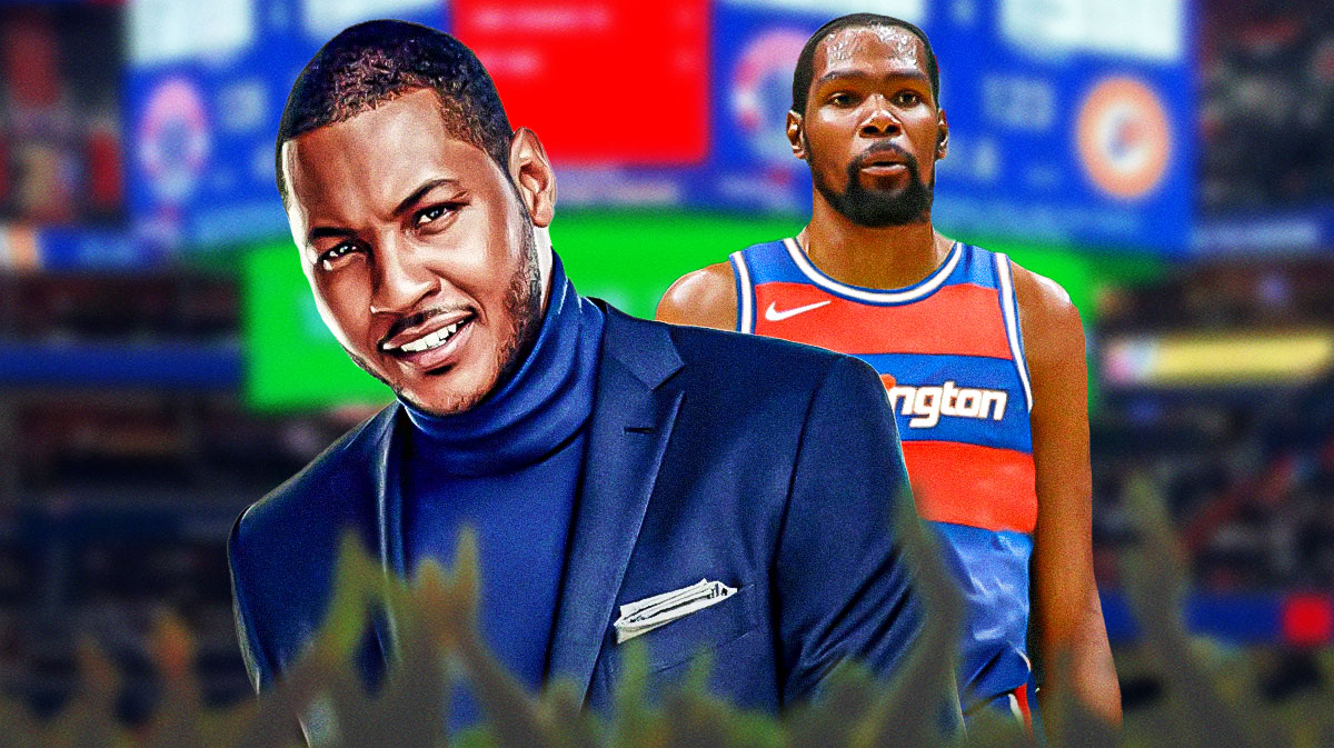 Carmelo Anthony smiles at Kevin Durant, who’s wearing a Wizards jersey