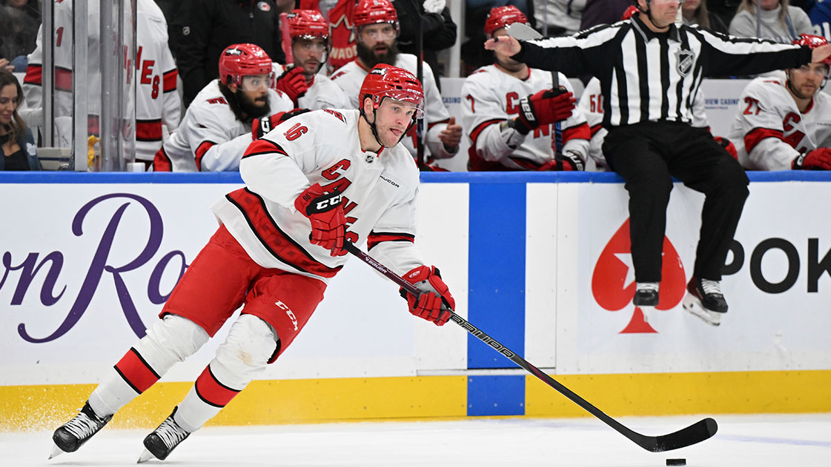 Carolina Hurricanes forward Mikko Rantanen (96) skates with the puck against the Toronto Maple Leafs in the third period at Scotiabank Arena.