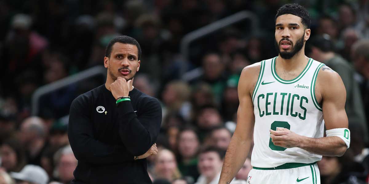 Boston Celtics Chief Trainer Joe Mazzull and Boston Celtics Next Jaison Tatum (0) react during the first half against Memphis Grizzlies in TD garden. 