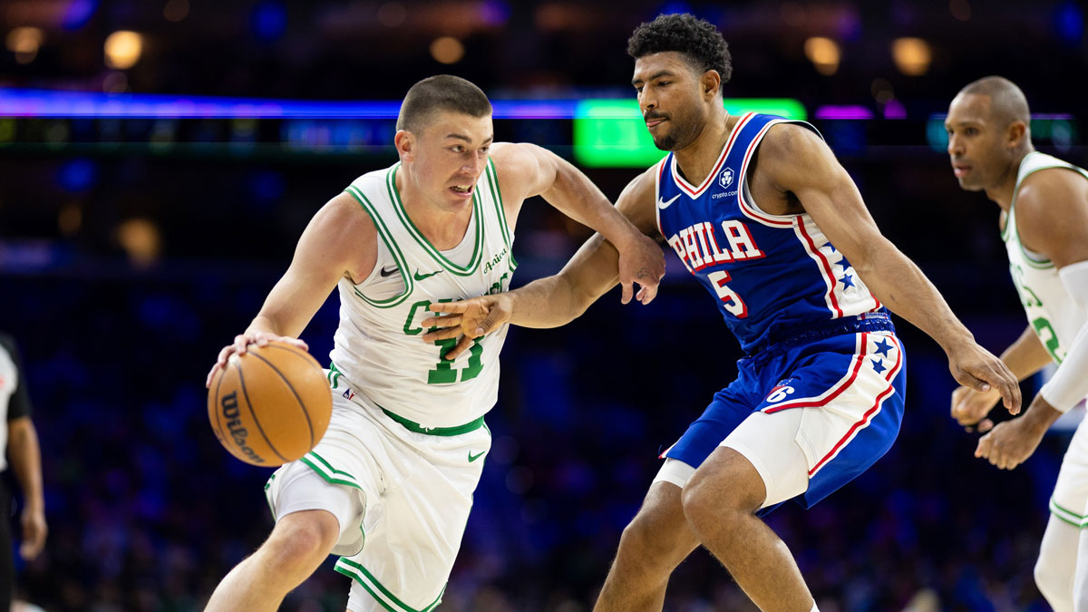 Celtics Guard Payton Pritchard (11) Vehicles against Philadelphia 76ers Guard Kuentina Grimes (5) During the second quarter in Wells Fargo Center