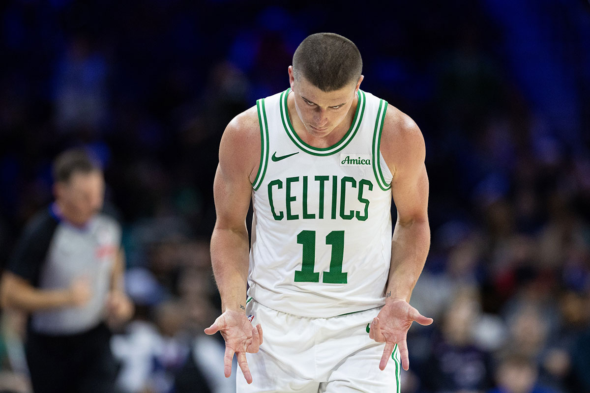 Boston Celtics guard Payton Pritchard (11) reacts to his three pointer against the Philadelphia 76ers during the fourth quarter at Wells Fargo Center.