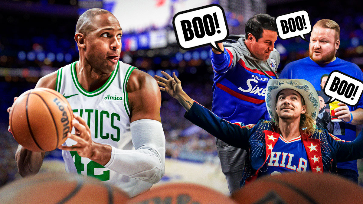 Celtics center Al Horford next to screaming 76ers fans with the words Boo and the Wells Fargo Center in the background