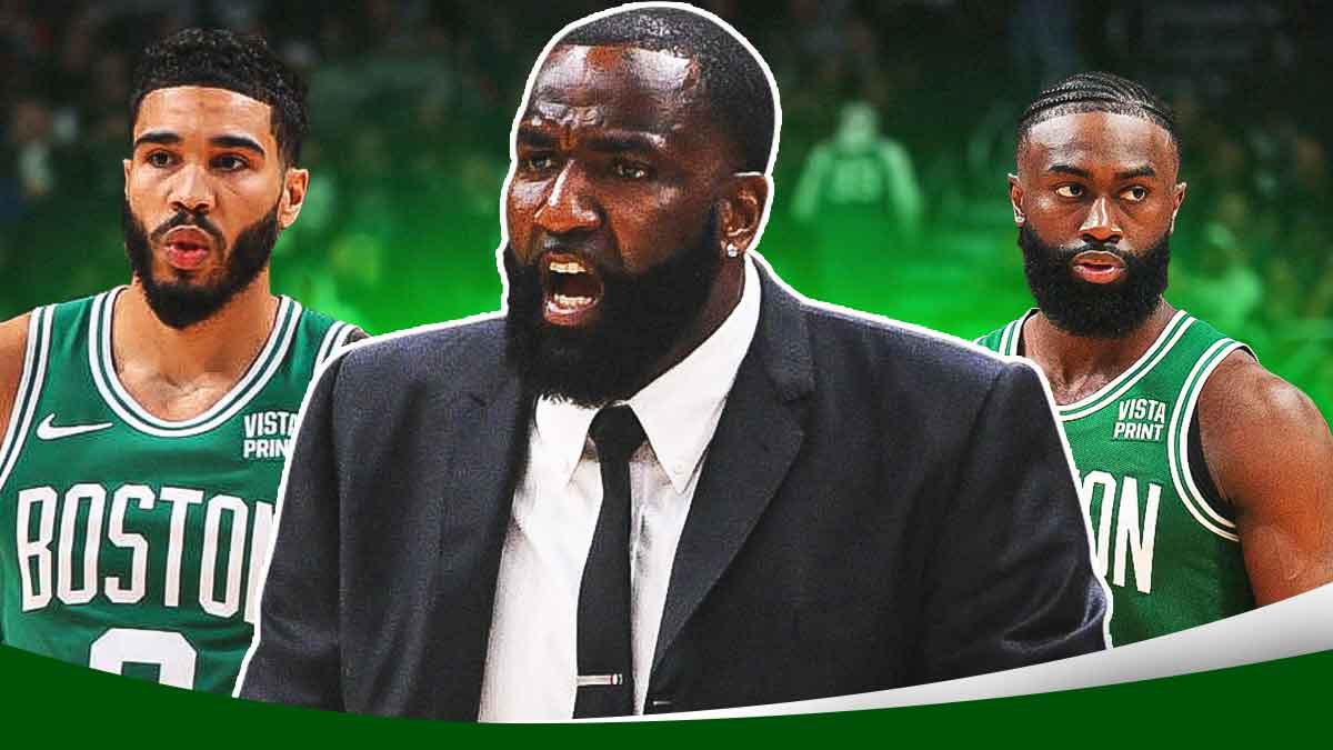 Kendrick Perkins in the middle (in street clothes) with Celtics' Jayson Tatum on one side and Jaylen Brown on the other