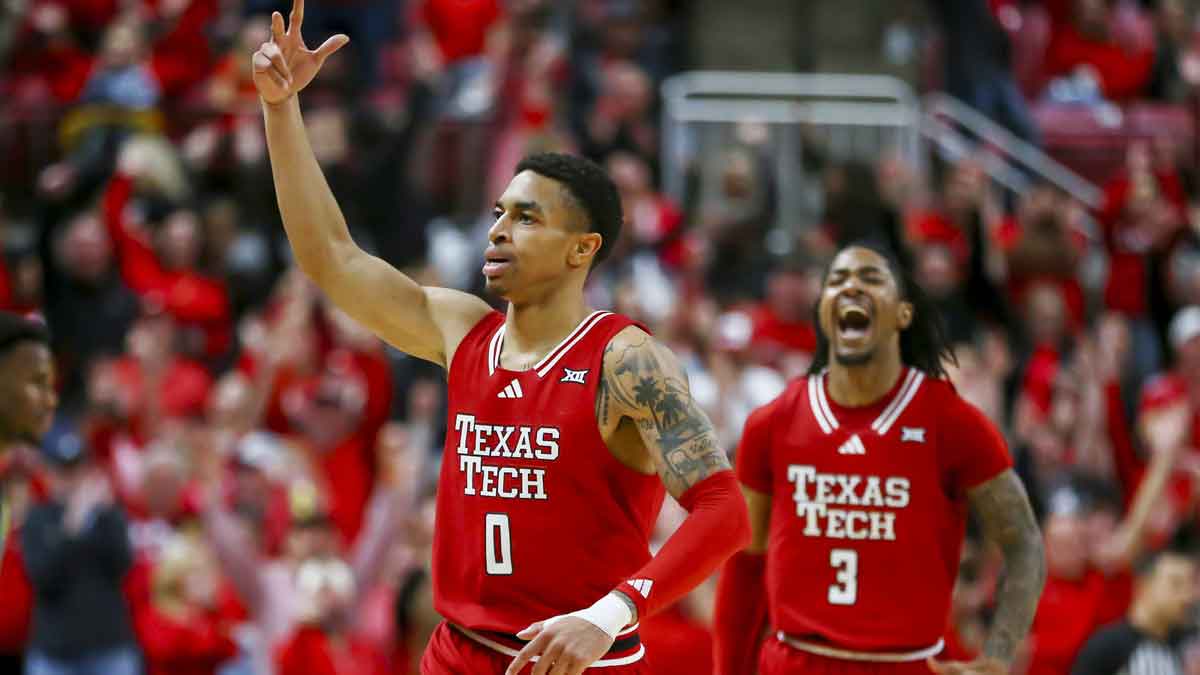 Texas Tech Red Raiders Chard Chance McMillian (0) reacts with Elijah Hawkins (3) in the second half in the game against Medved Baylor in the United Supermarkets Arena. 