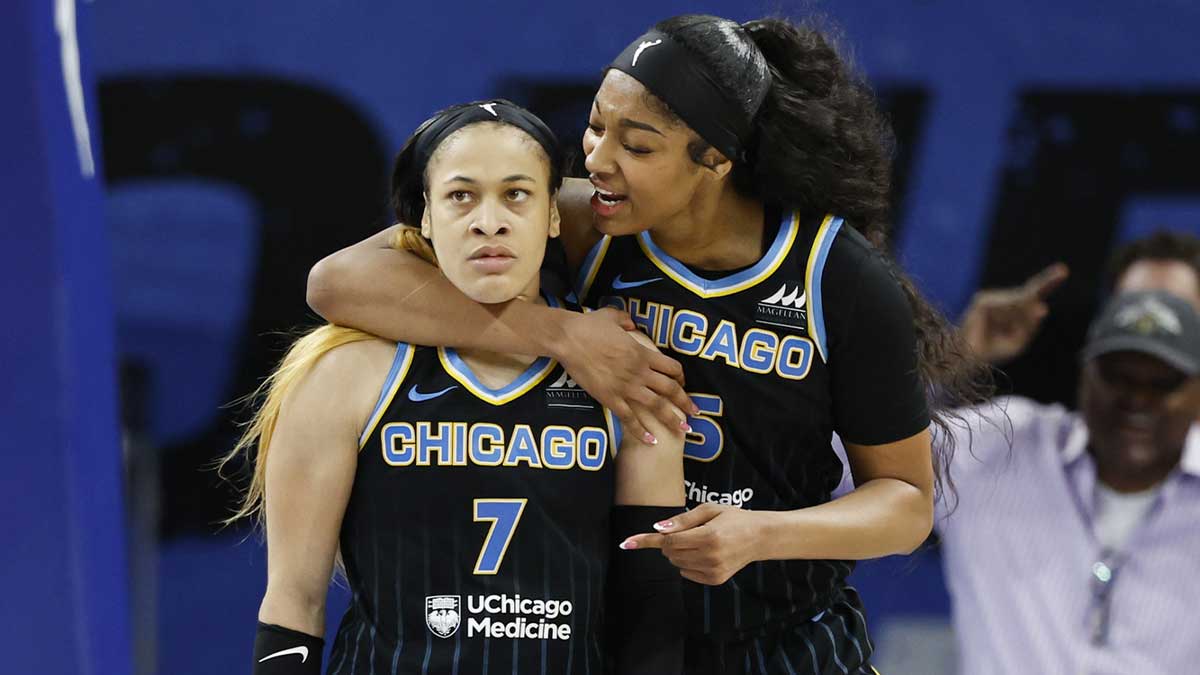 WNBA Chicago Sky guard Chennedy Carter (7) reacts next to forward Angel Reese (5) after scoring against the Las Vegas Aces during the second half at Wintrust Arena.