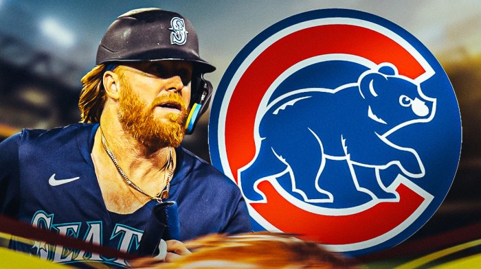 Justin Turner (Mariners) with Chicago Cubs logo in the background