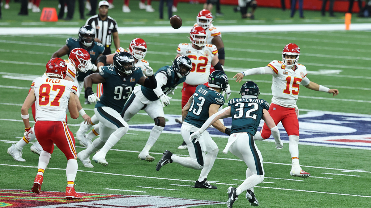 Kansas City Chiefs quarterback Patrick Mahomes (15) completes a pass to Kansas City Chiefs tight end Travis Kelce (87) against the Philadelphia Eagles in the third quarter in Super Bowl LIX at Ceasars Superdome.