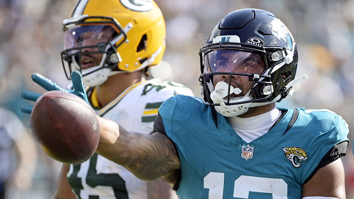Jacksonville Jaguars wide receiver Christian Kirk (13) signals a first down during the second half against the Green Bay Packers at EverBank Stadium.