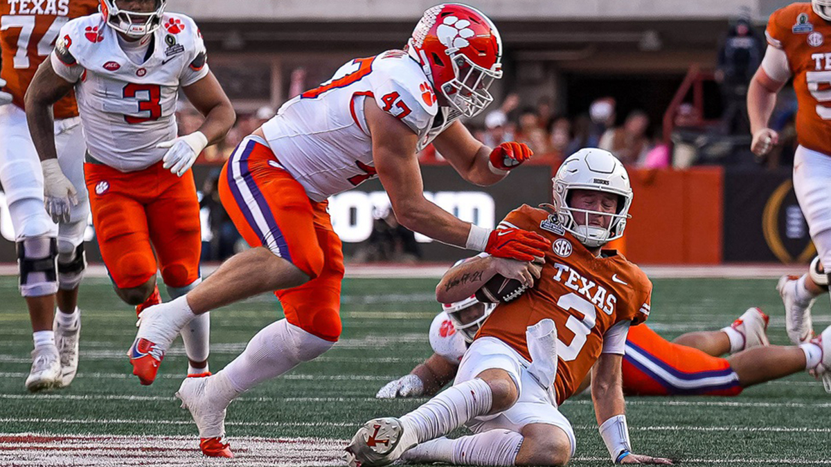 Texas Longhorns quarterback Quinn Ewers (3) slides for a first down during the game against Clemson in the first round of the College Football Playoffs at Darrell K Royal-Texas Memorial Stadium on Saturday, Dec. 21, 2024.