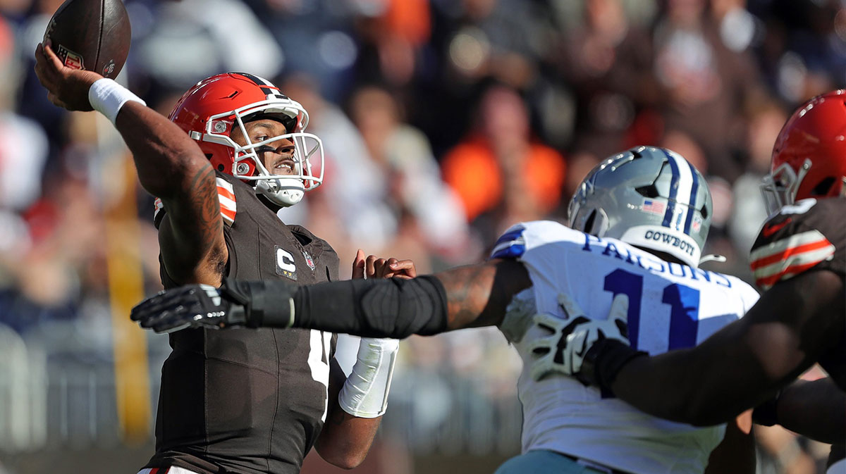 Browns QB Deshaun Watson throws as Dallas Cowboys linebacker Micah Parsons closes in during the first half, Sunday, Sept. 8, 2024, in Cleveland.