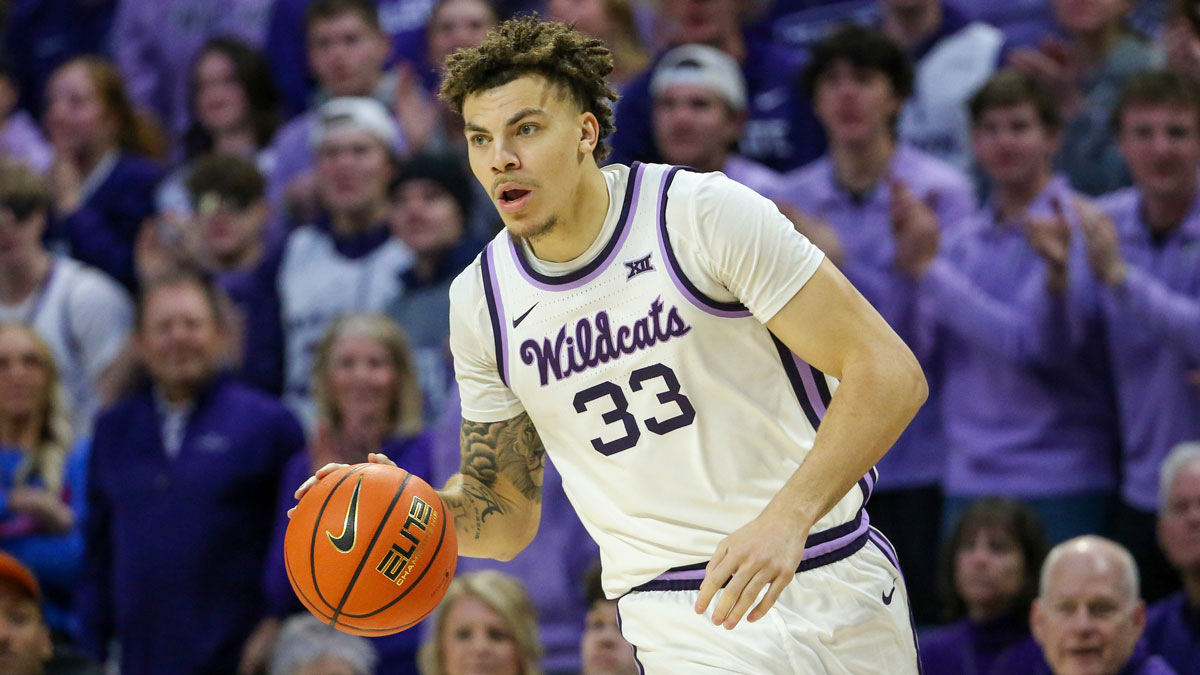Kansas State Wildcats forward Coleman Hawkins (33) brings the ball up court during the first half against the Kansas Jayhawks at Bramlage Coliseum.