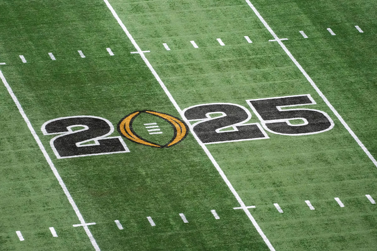 The College Football Playoff National Championship logo on the field at Mercedes-Benz Stadium, the site of the 2025 College Football Playoff National Championship between the Ohio State Buckeyes and the Notre Dame Fighting Irish.
