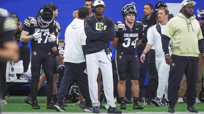 Colorado Buffaloes head coach Deion Sanders reacts from the sideline during the third quarter against the Brigham Young Cougars at Alamodome.