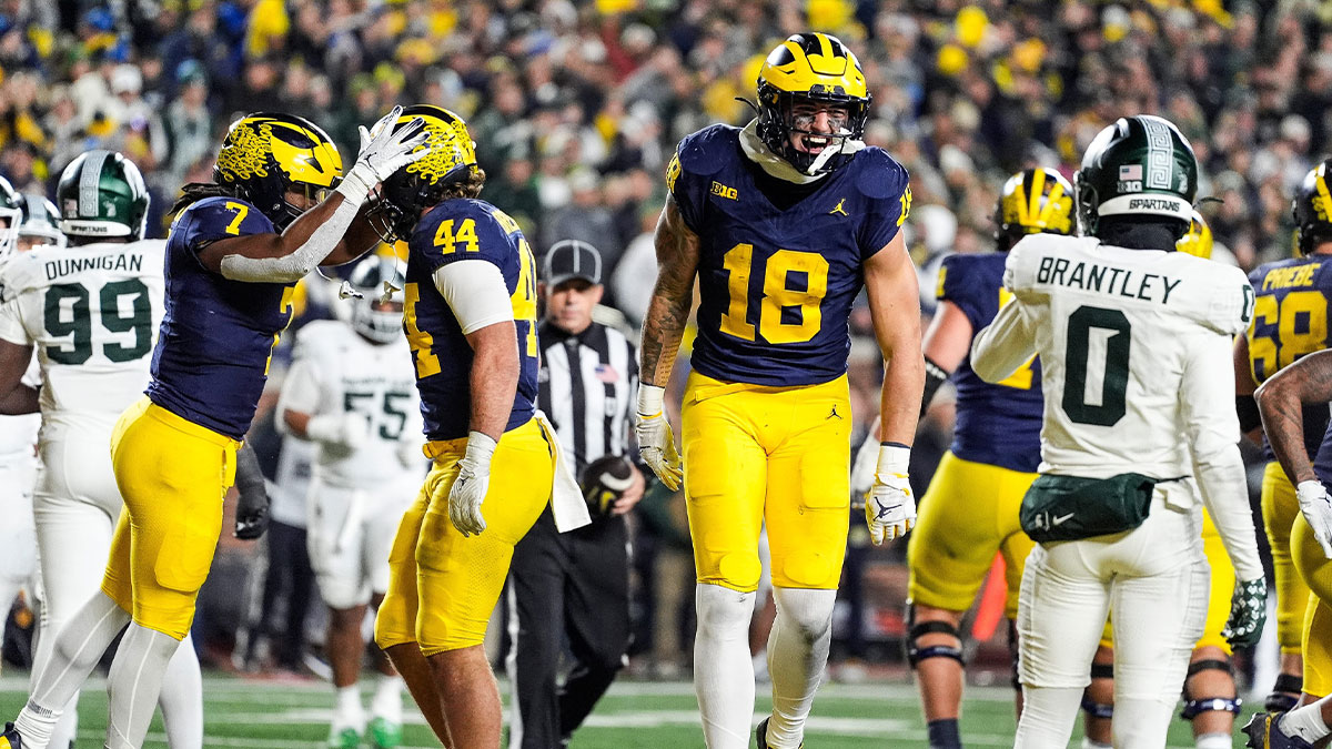 Michigan tight end Colston Loveland (18) celebrates scoring a touchdown against Michigan State during the second half at Michigan Stadium in Ann Arbor on Saturday, Oct. 26, 2024.