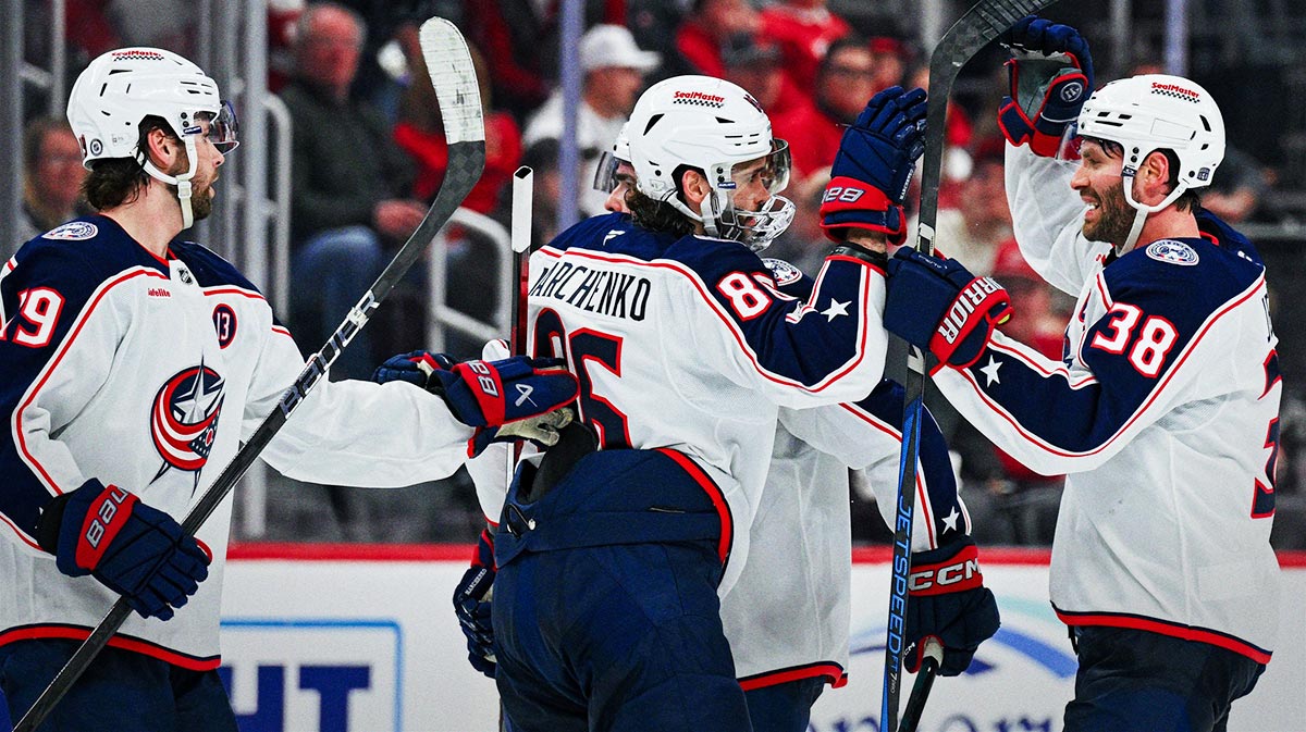 Columbus Blue Jackets right wing Kirill Marchenko (86) celebrates after his goal with teammates during the third period against the Detroit Red Wings at Little Caesars Arena.