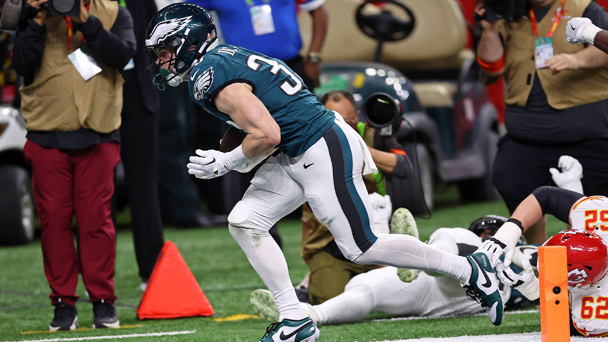 Philadelphia Eagles cornerback Cooper DeJean (33) scores a touchdown after making an interception against the Kansas City Chiefs during the first half of Super Bowl LIX at Caesars Superdome.