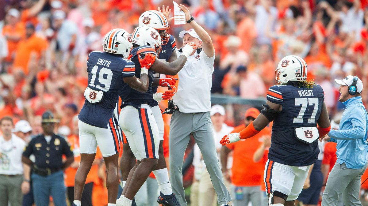 Auburn Tigers defensive coordinator DJ Durkin celebrates a sack with his defense as Auburn Tigers take on Oklahoma Sooners at Jordan-Hare Stadium