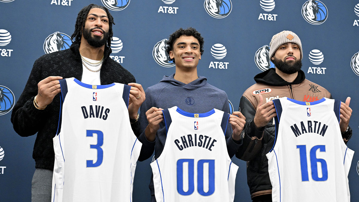 Dallas Mavericks Next Anthony Davis (3) and store Max Christie (00) and Caleb Martin (16) is posed for a photo with its new MAV jerseys during the press conference at Dallas Mavericks.