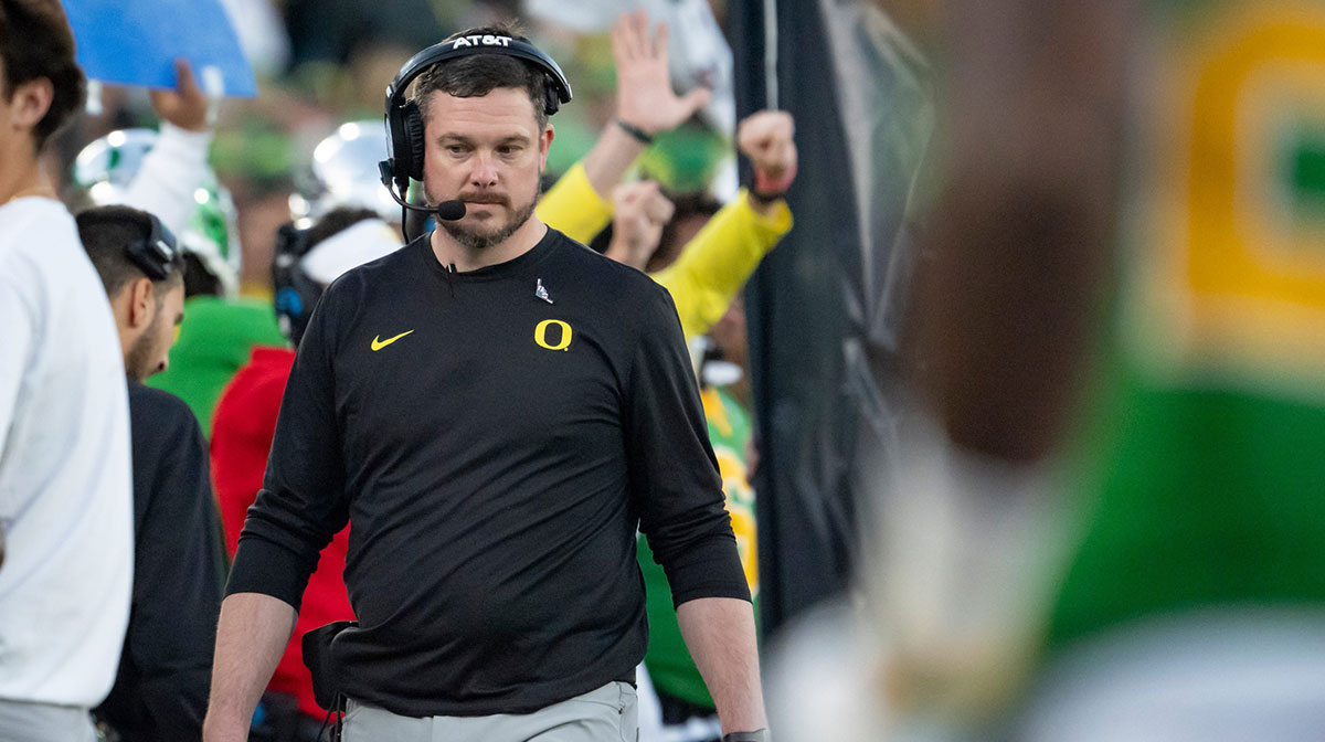 Oregon head coach Dan Lanning looks down during the second half as the Oregon Ducks face the Ohio State Buckeyes