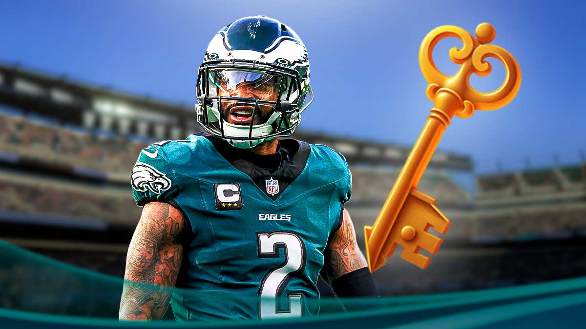 Darius Slay in a Philadelphia Eagles uniform with a big golden key as Slay gets key to city of brunswick, georgia.