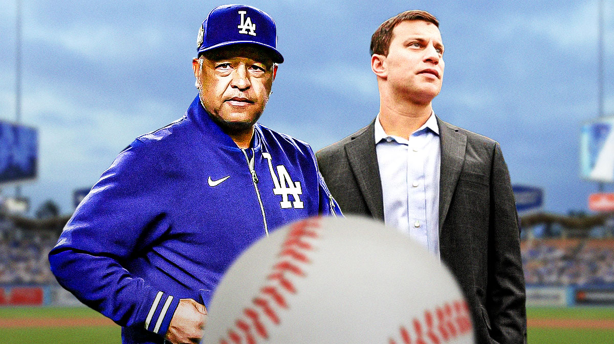 Dodgers manager Dave Roberts and president of baseball operations Andrew Friedman, Dodger Stadium behind them