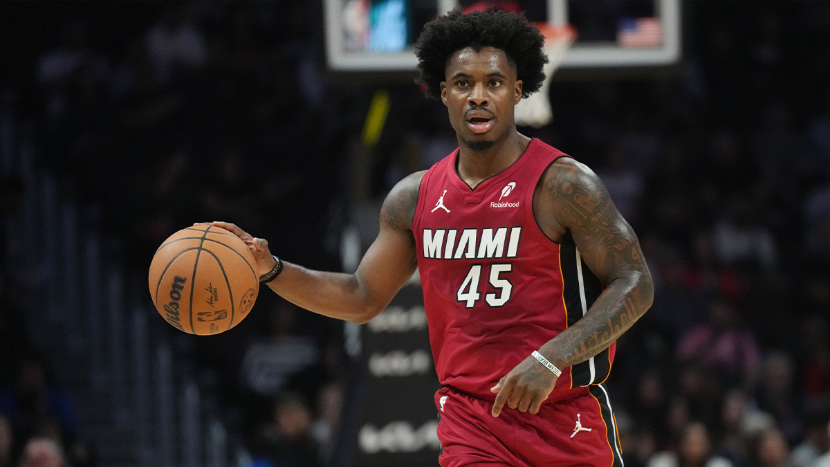 Miami Heat guard Davion Mitchell (45) brings the ball up the court against the Atlanta Hawks in the first half at Kaseya Center. 