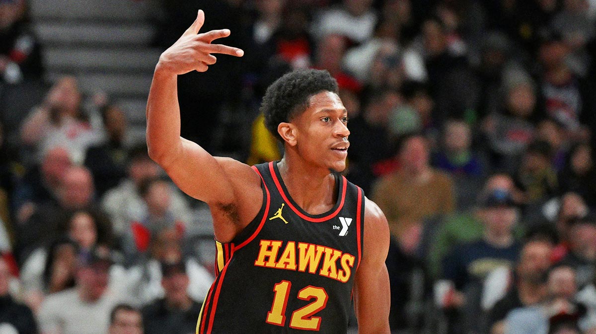     The Atlanta Hawks striker of'Andre Hunter (12) reacts after having made a three -point basket against the Raptors of Toronto in the second half in Scotiabank Arena.