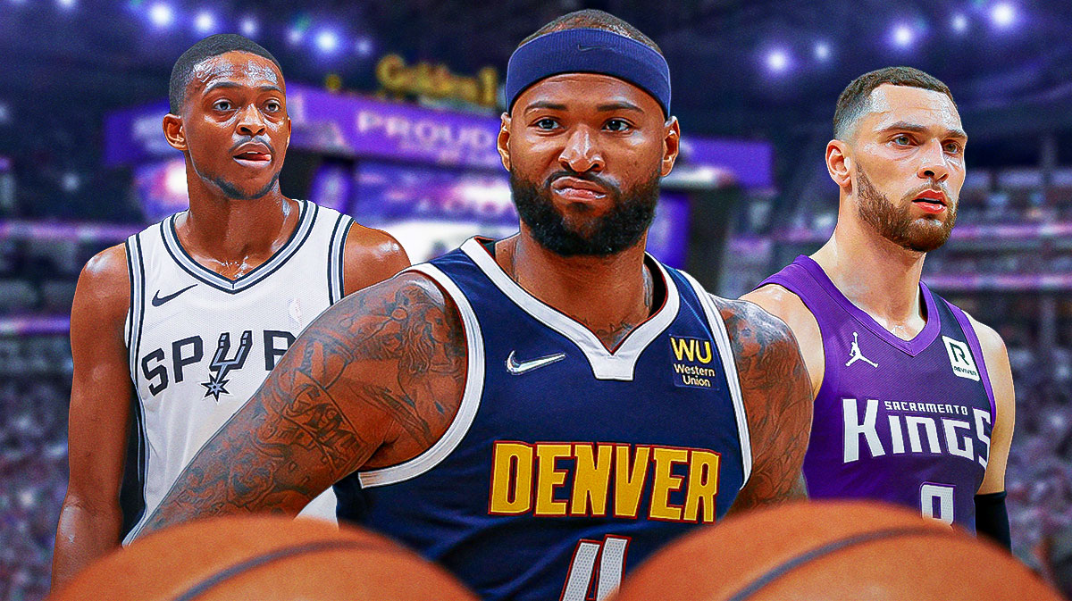 Retired forward DeMarcus Cousins in between Kings guard Zach LaVine and Spurs guard De'Aaron Fox