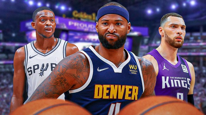 Retired forward DeMarcus Cousins in between Kings guard Zach LaVine and Spurs guard De'Aaron Fox