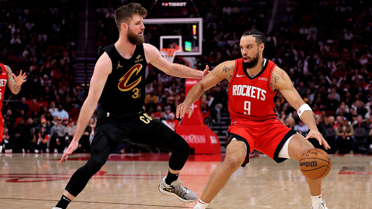 Houston Rockets forward Dillon Brooks (9) handle the ball against Cleveland Cavaliers forward Dean Wade (32) during the fourth quarter at Toyota Center.