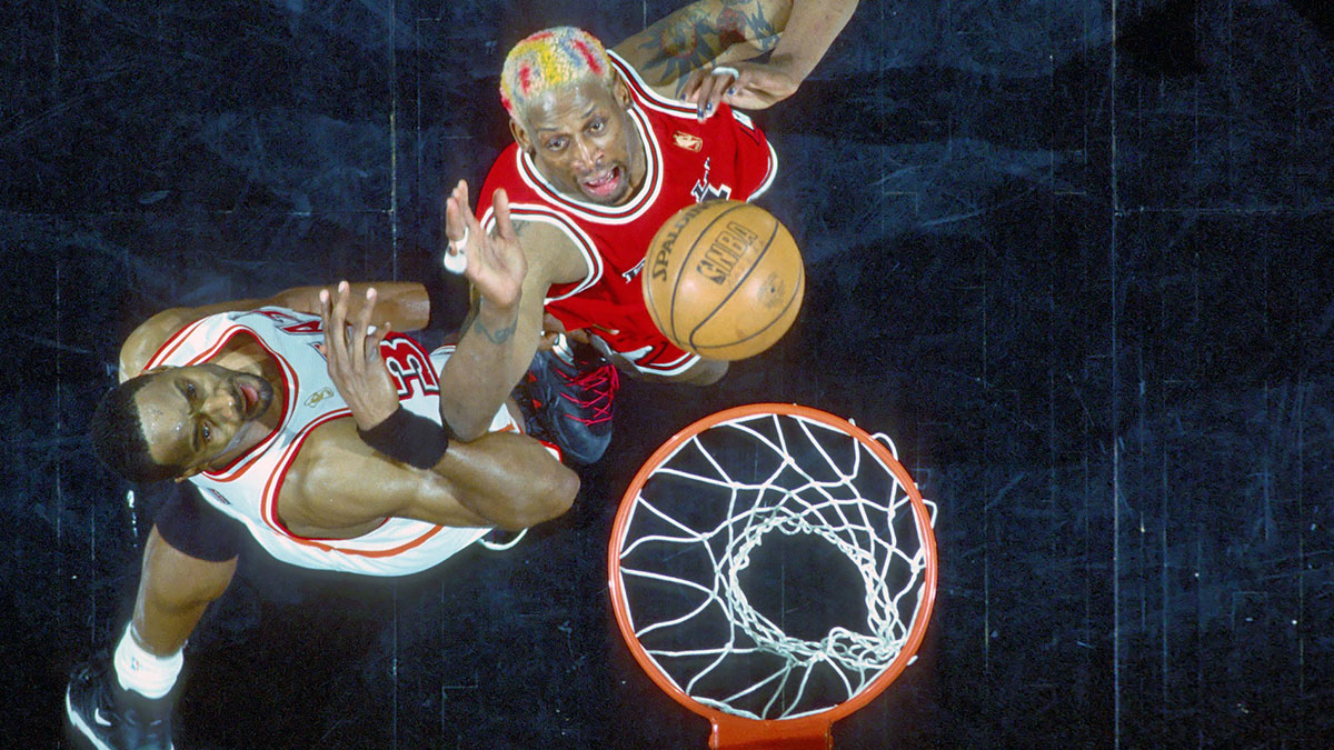 Chicago Bulls forward #91 DENNIS RODMAN looks to rebound against Miami Heat center ALONZO MOURNING at the Miami Arena during the 1996-97 season. Mandatory Credit: Photo By Imagn Images (c) Copyright Imagn Images