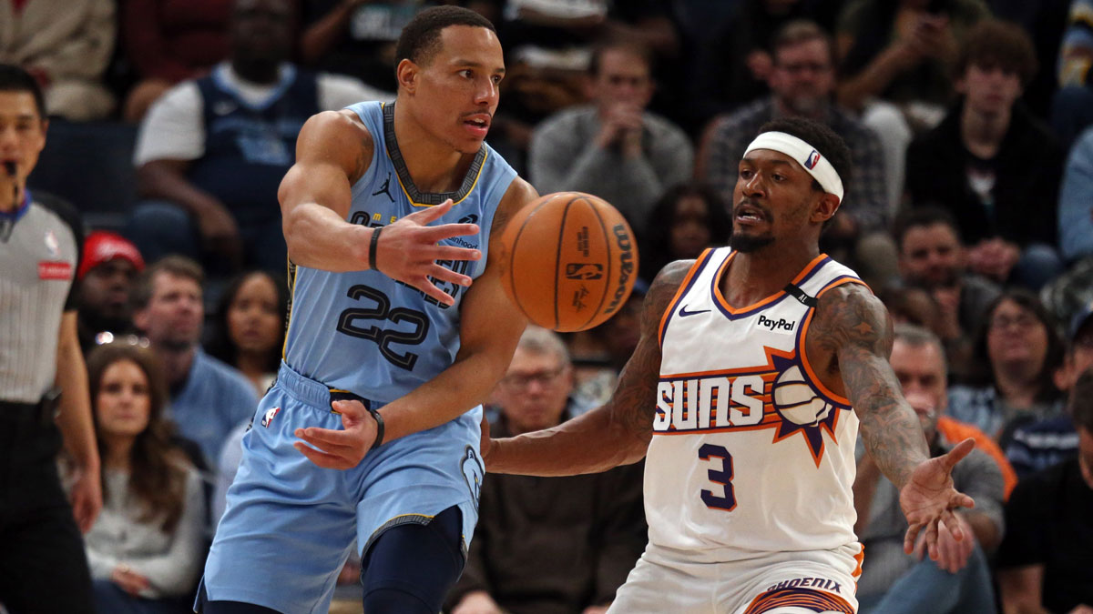 Memphis Grizzlies guard Desmond Bane (22) passes the ball as Phoenix Suns guard Bradley Beal (3) defends during the third quarter at FedExForum.