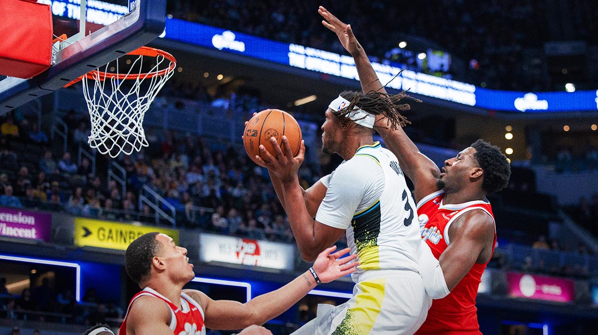 Indiana Pacers center Myles Turner (33) shoots the ball while Memphis Grizzlies forward Jaren Jackson Jr. (13) defends in the second half at Gainbridge Fieldhouse.